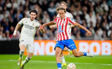 维尼修斯梅开二度助皇马10人逆转马竞 5连胜紧追西甲榜首